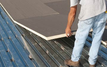 benefits of insulating Neuadd flat roofing